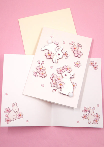 Carte 3D et enveloppe - Lapins blancs et sakura - Schinako Moriyama